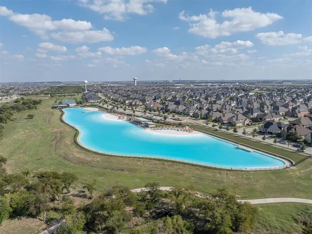 a view of a swimming pool with a lake view
