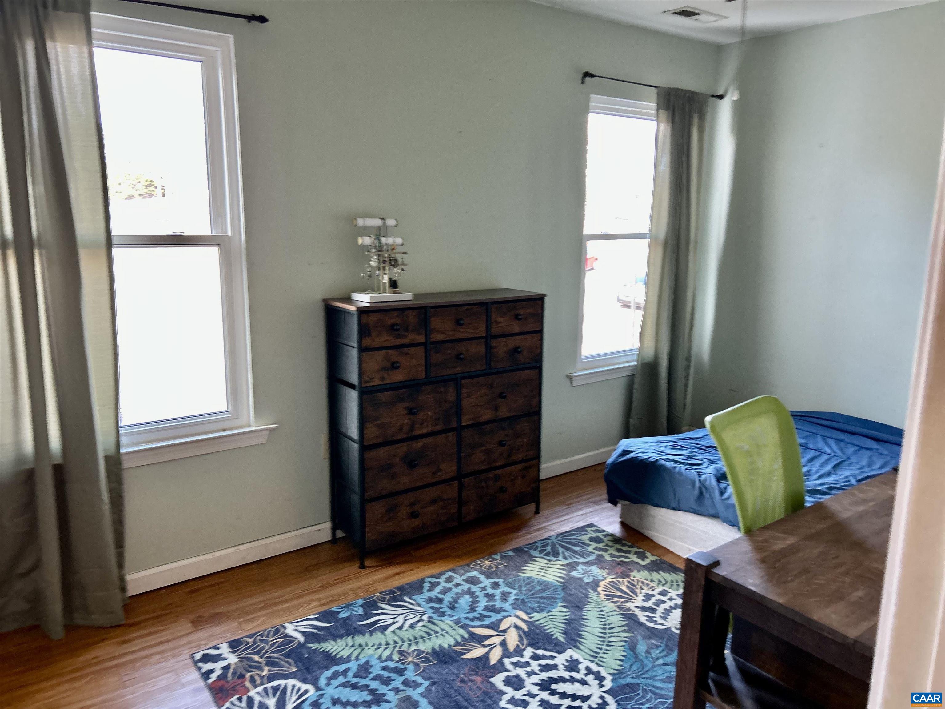 340 Riverside Avenue Charlottesville, VA 22902 - Photo 12 of 17 a living room with furniture and wooden floor