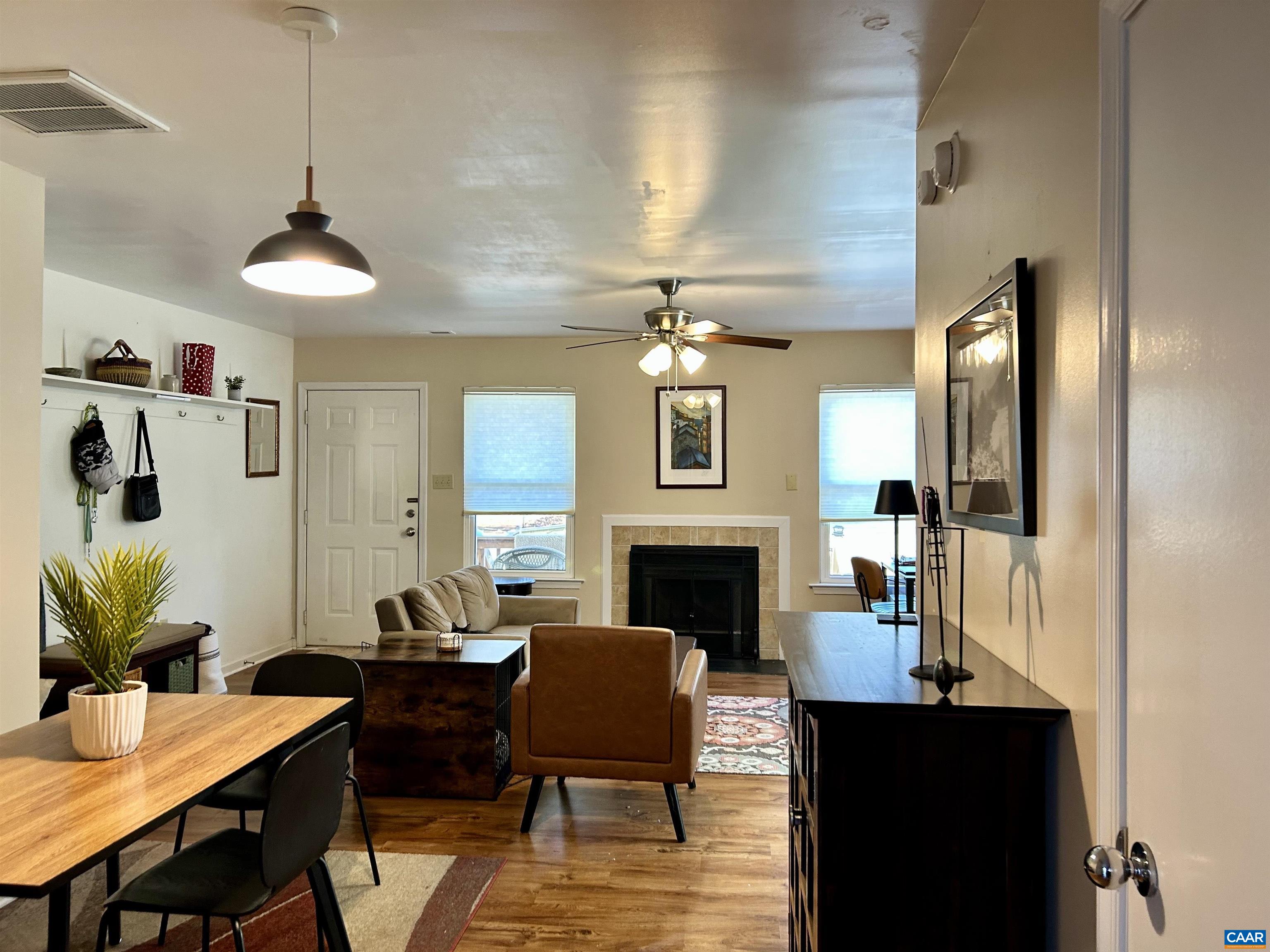 340 Riverside Avenue Charlottesville, VA 22902 - Photo 3 of 17 a view of a livingroom with furniture window and wooden floor