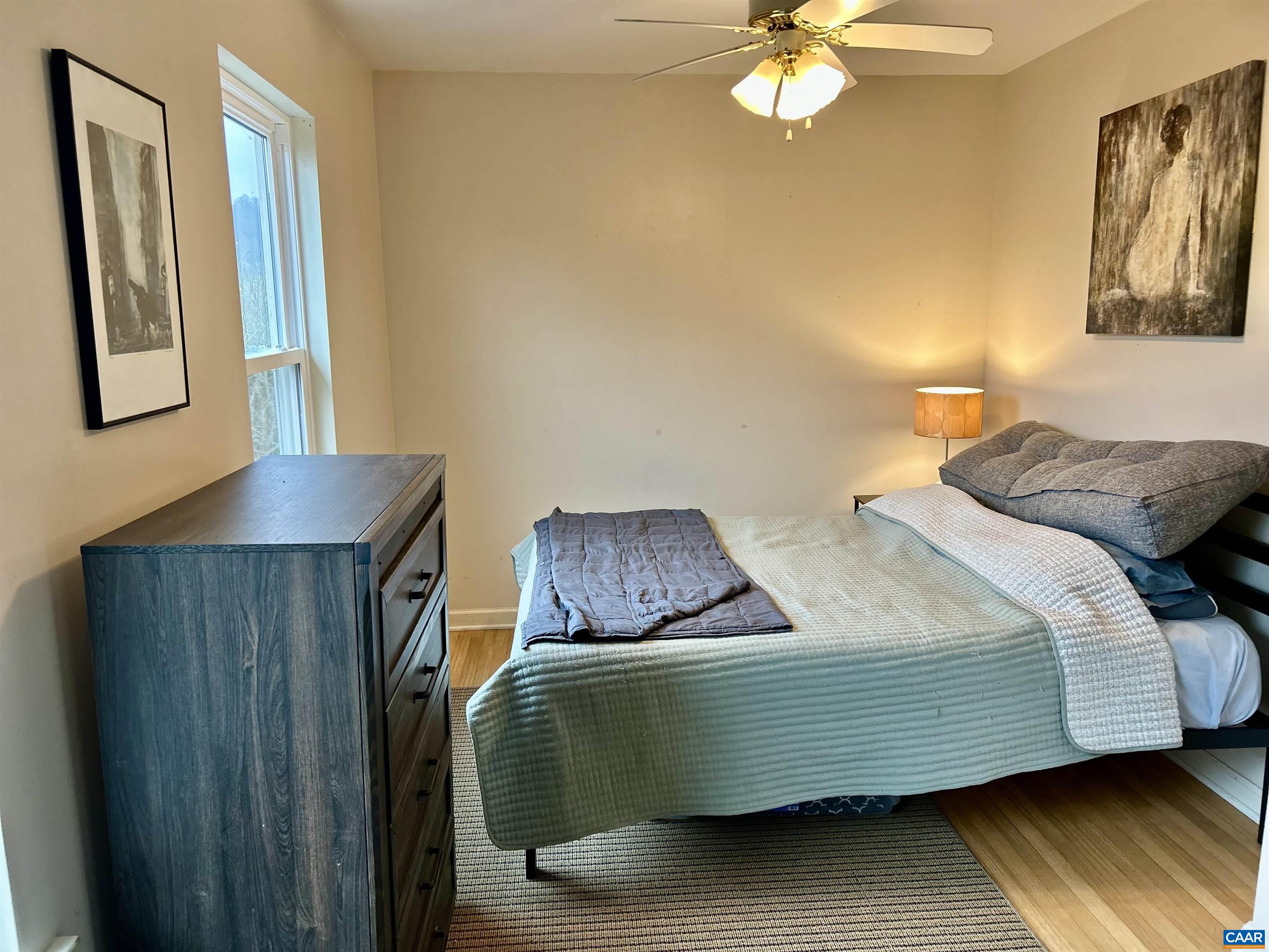 340 Riverside Avenue Charlottesville, VA 22902 - Photo 9 of 17 a bedroom with a bed and window