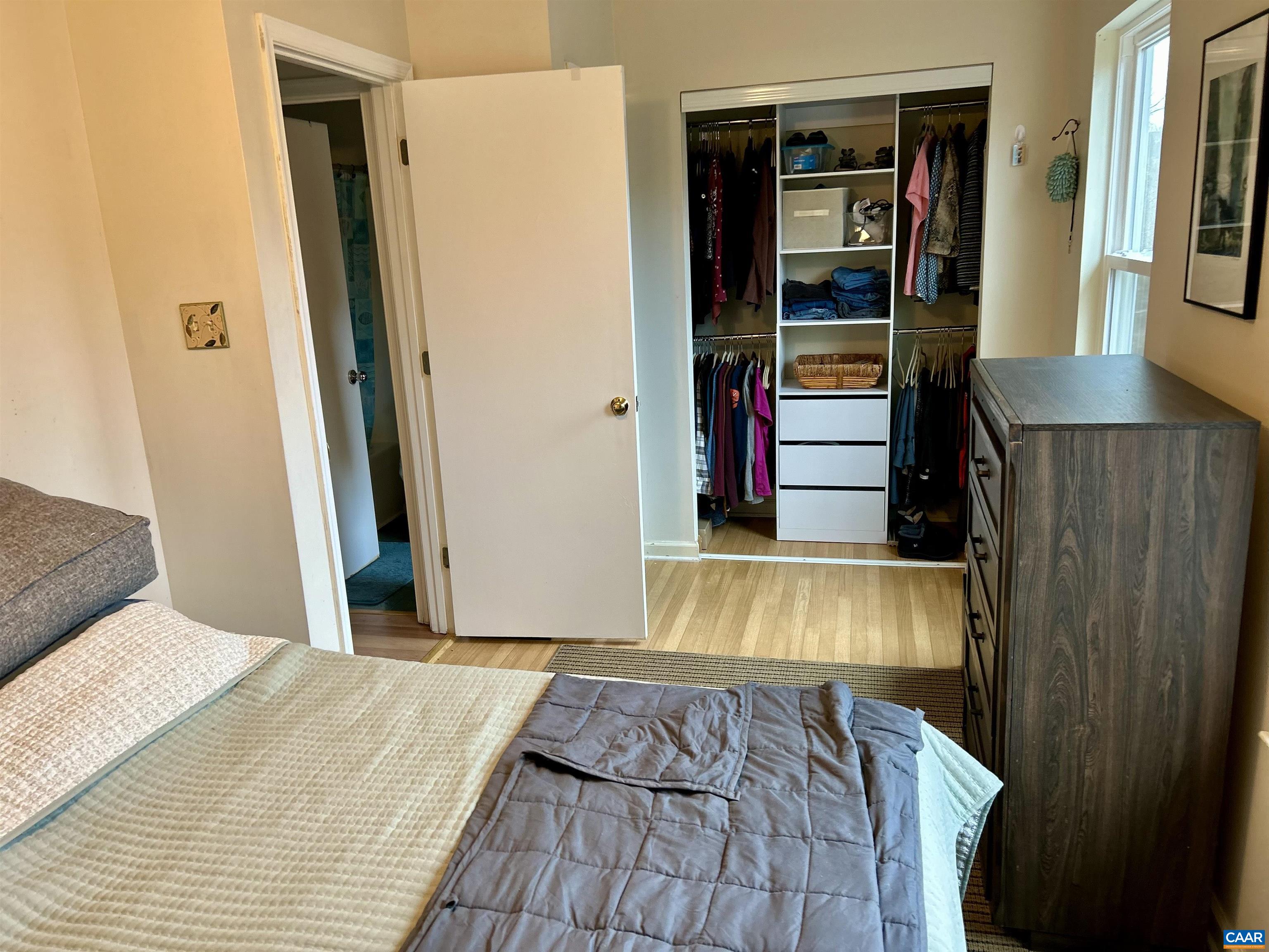 340 Riverside Avenue Charlottesville, VA 22902 - Photo 10 of 17 a bedroom with bed and walk in closet