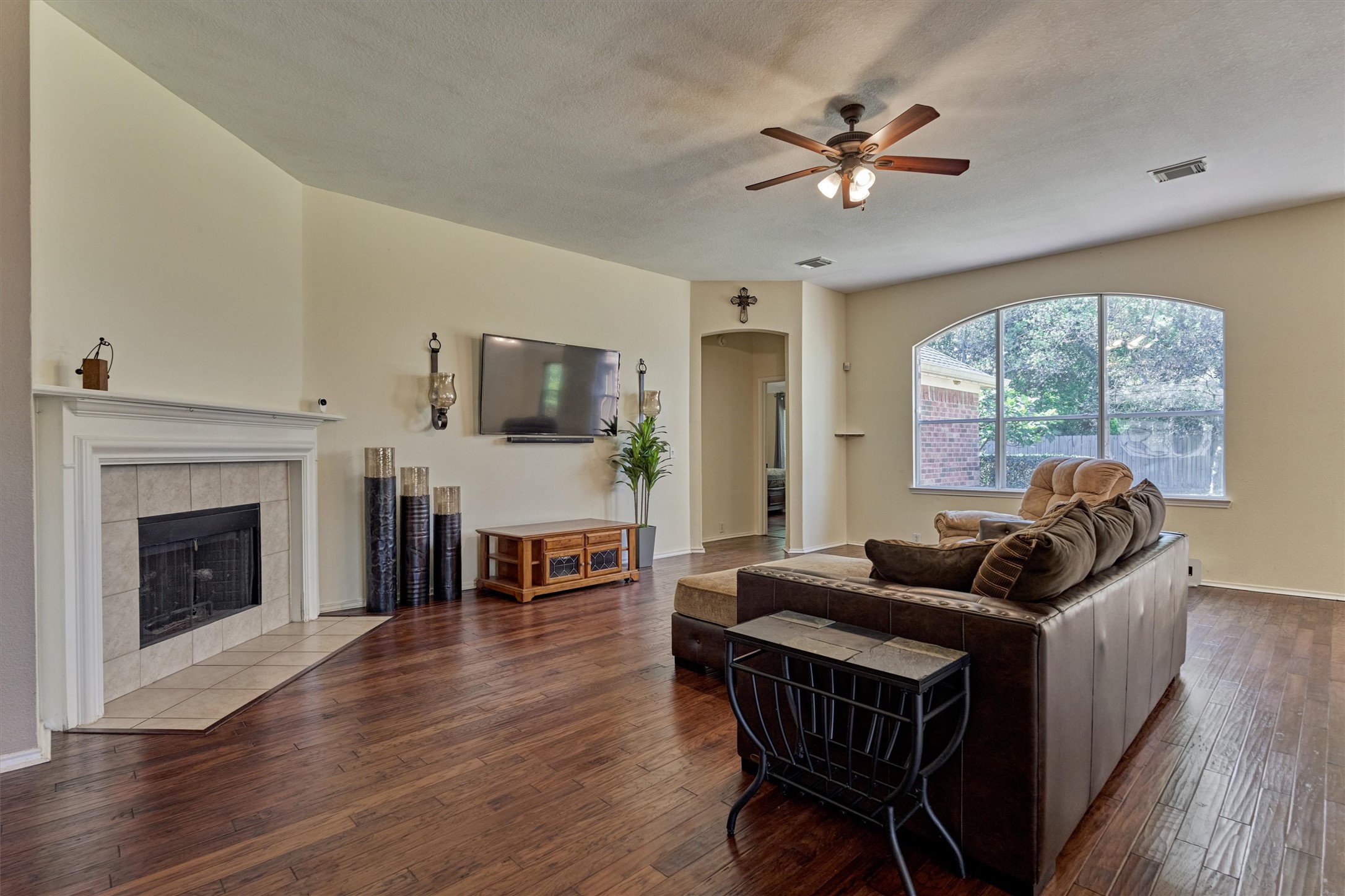 20835 Louetta Oak Drive Spring, TX 77388 - Photo 19 of 37 a living room with furniture and a fireplace