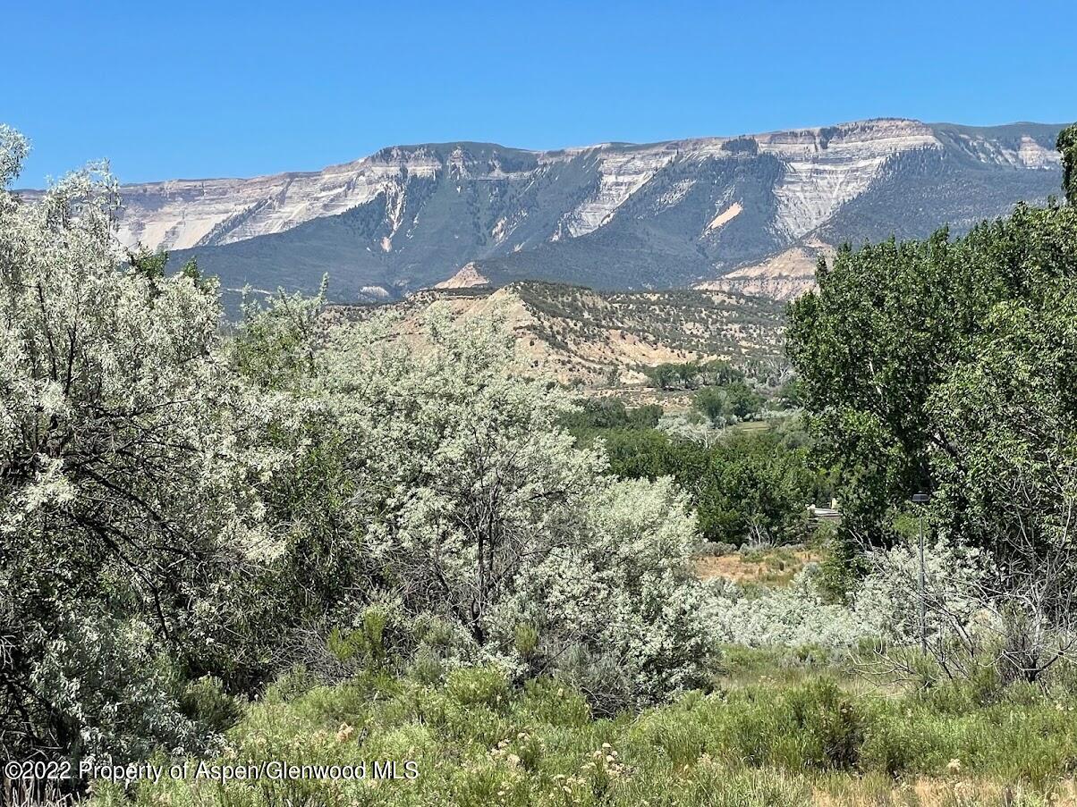 1331 Munro Avenue Rifle, CO 81650 - Photo 2 of 9 an aerial view of mountain with yard