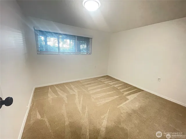 a view of a room with a window