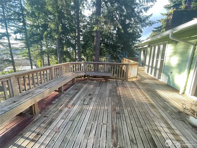 a view of balcony with wooden floor