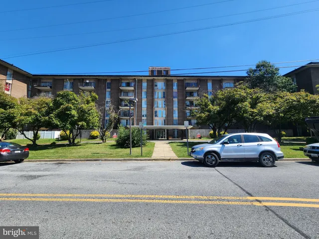 a view of street with parked cars