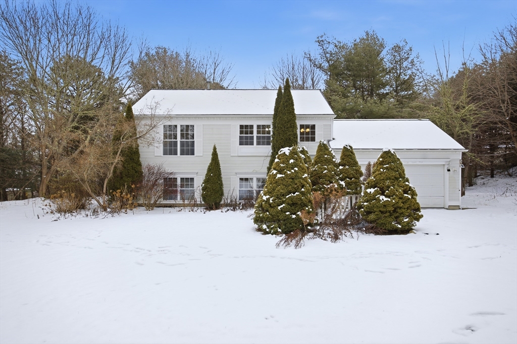 305 Raymond Road Plymouth, MA 02360 - Photo 1 of 29 a view of a house with a yard