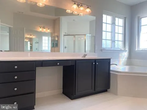 a kitchen with a sink and a window