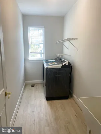 a utility room with washer and dryer