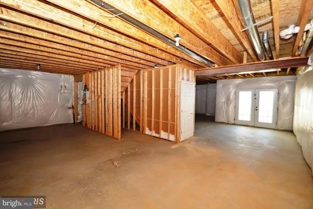 a view of a room with large windows