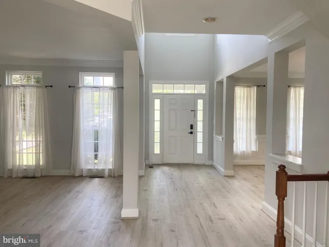 wooden floor and windows in an empty room