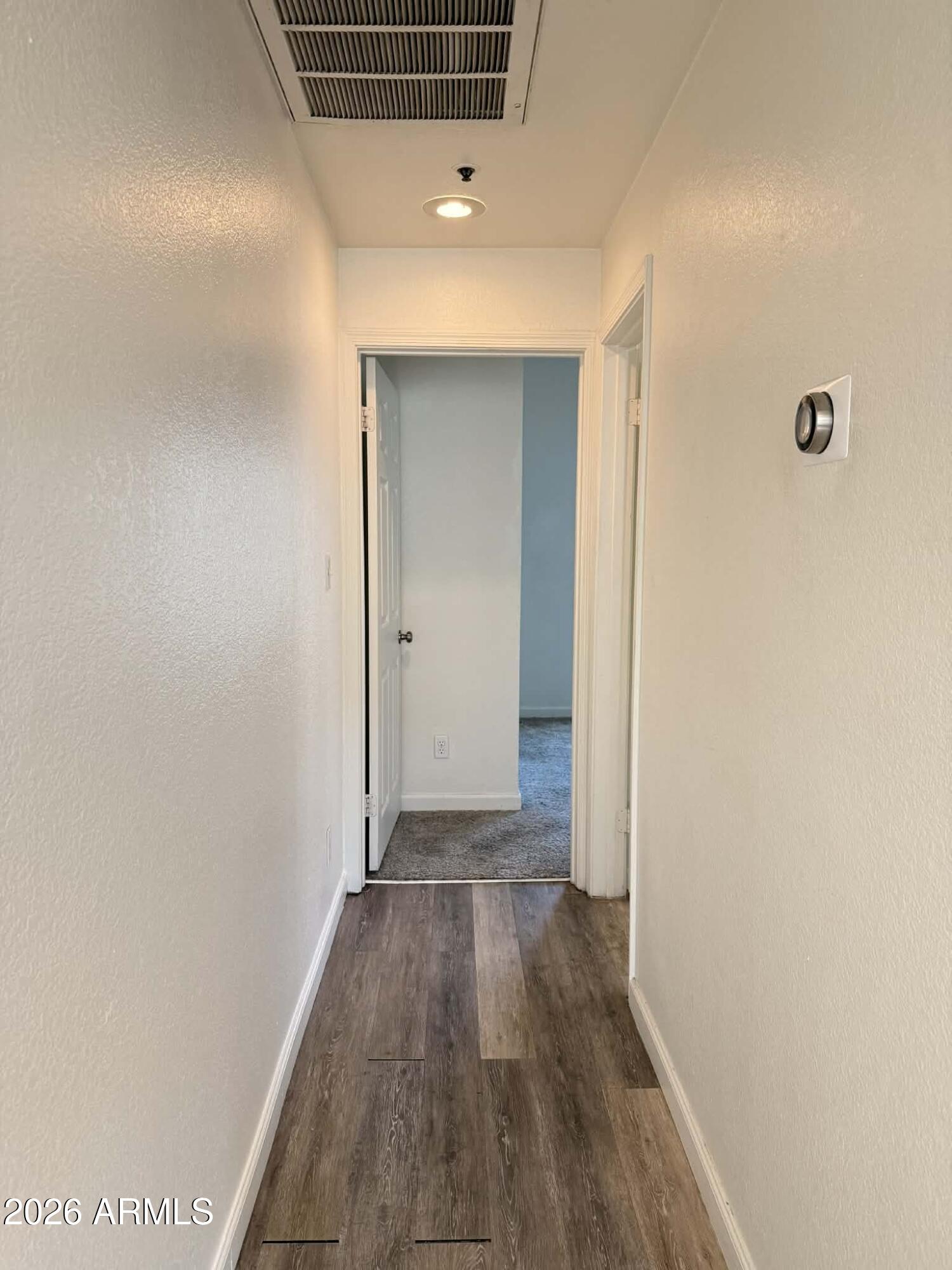 100 East Fillmore Street, Unit 208 Phoenix, AZ 85004 - Photo 14 of 22 hall to bdroom