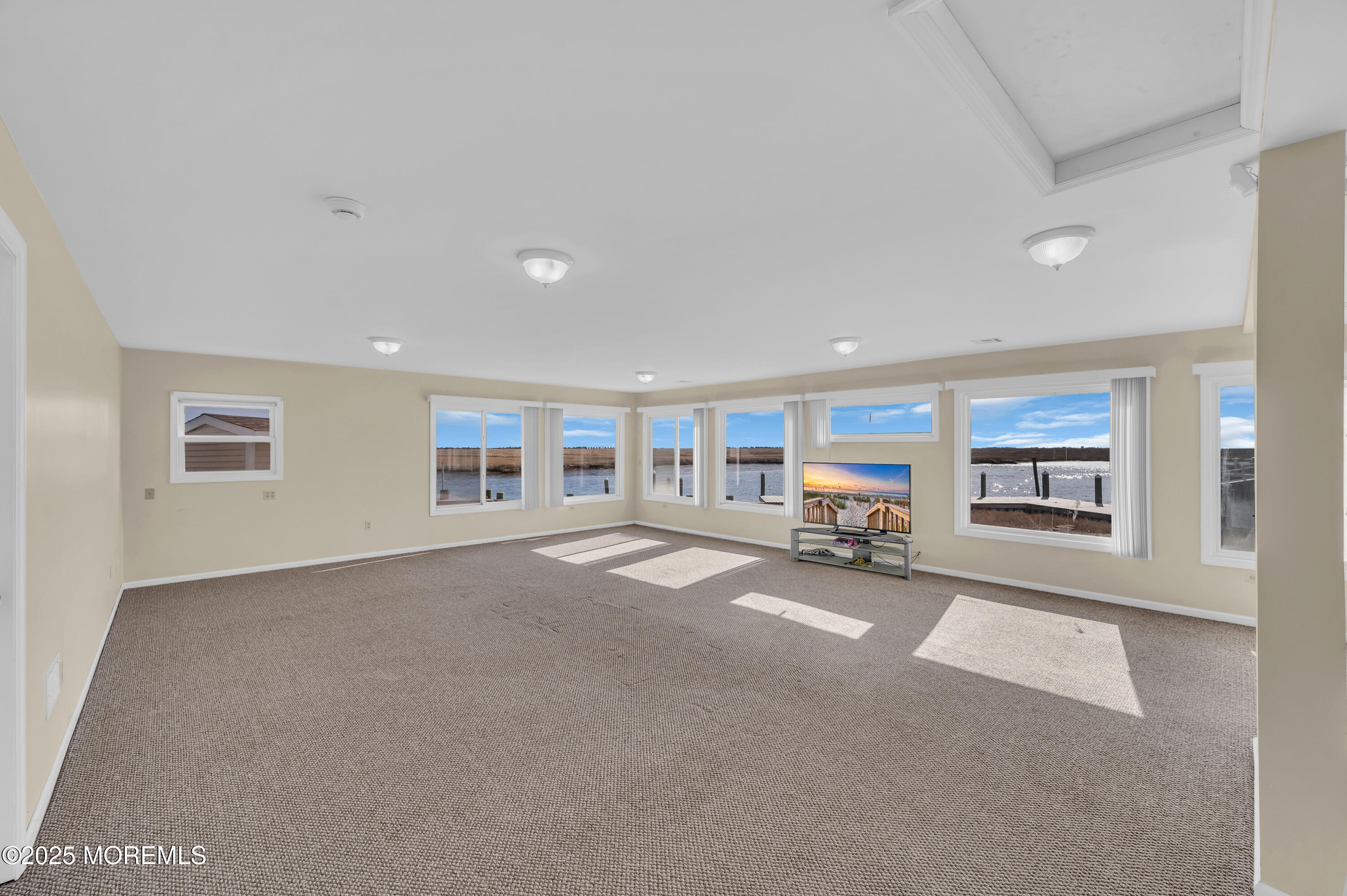 164 North Spinnaker Drive Little Egg Harbor, NJ 08087 - Photo 13 of 33 a view of a livingroom with furniture and a fireplace