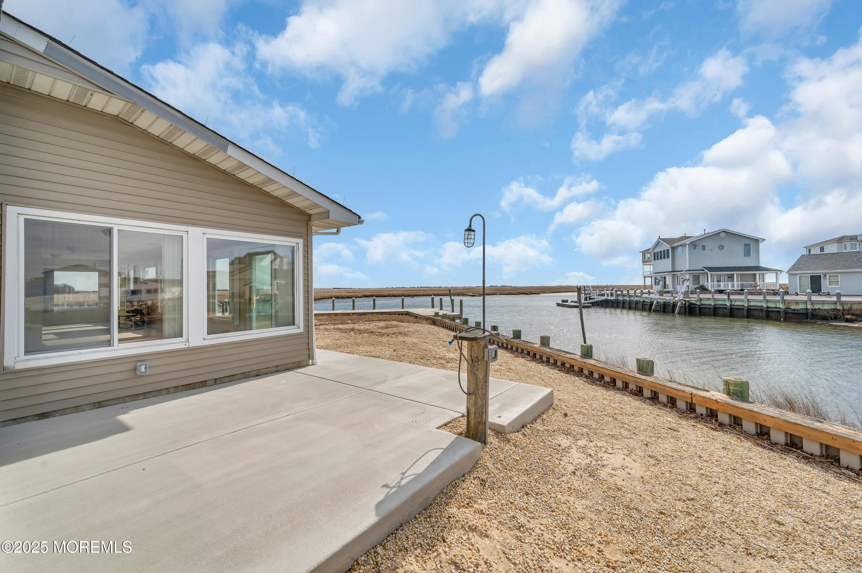 164 North Spinnaker Drive Little Egg Harbor, NJ 08087 - Photo 2 of 33 a view of a terrace with chairs