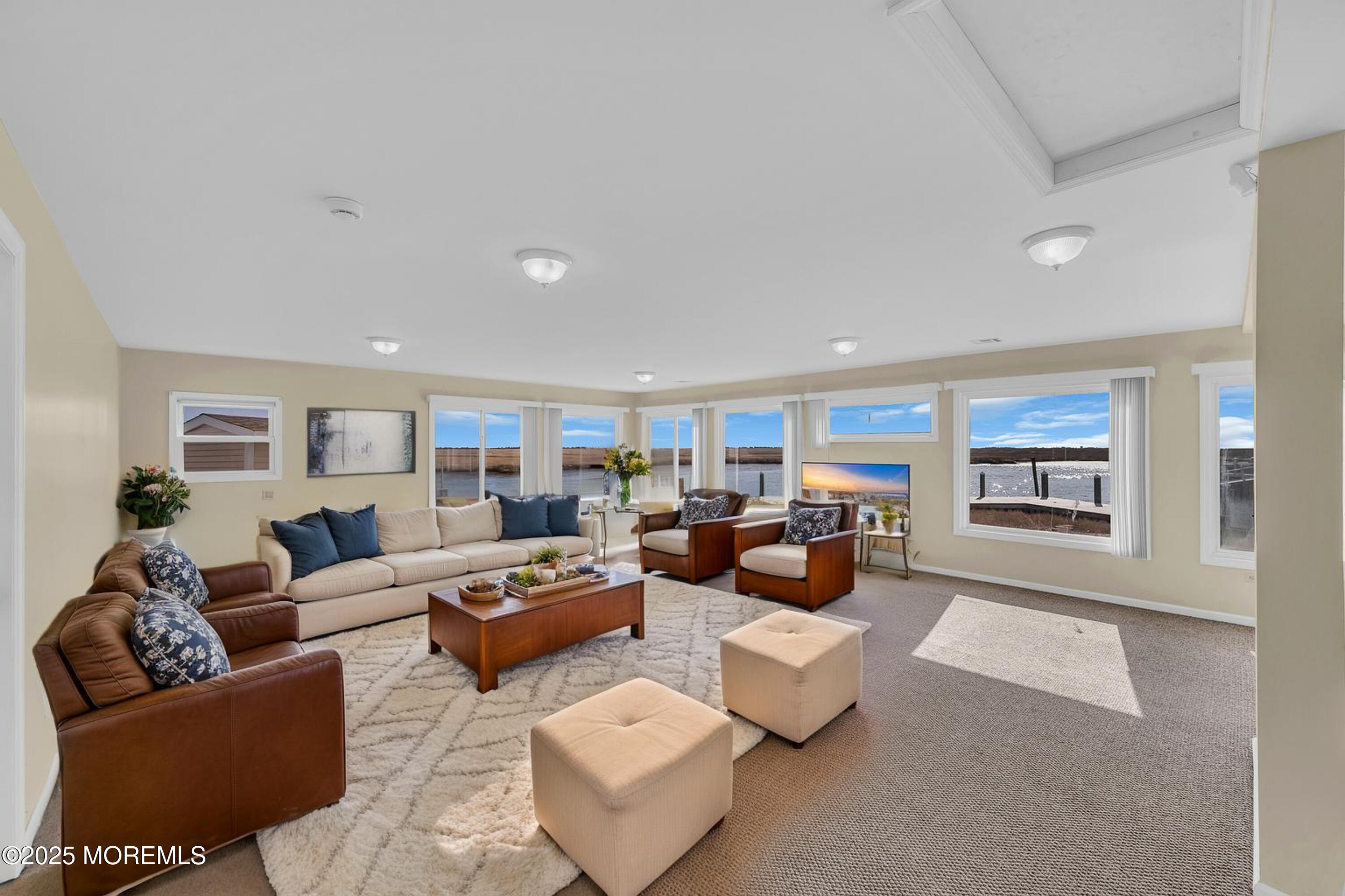 164 North Spinnaker Drive Little Egg Harbor, NJ 08087 - Photo 23 of 33 a living room with furniture and a large window