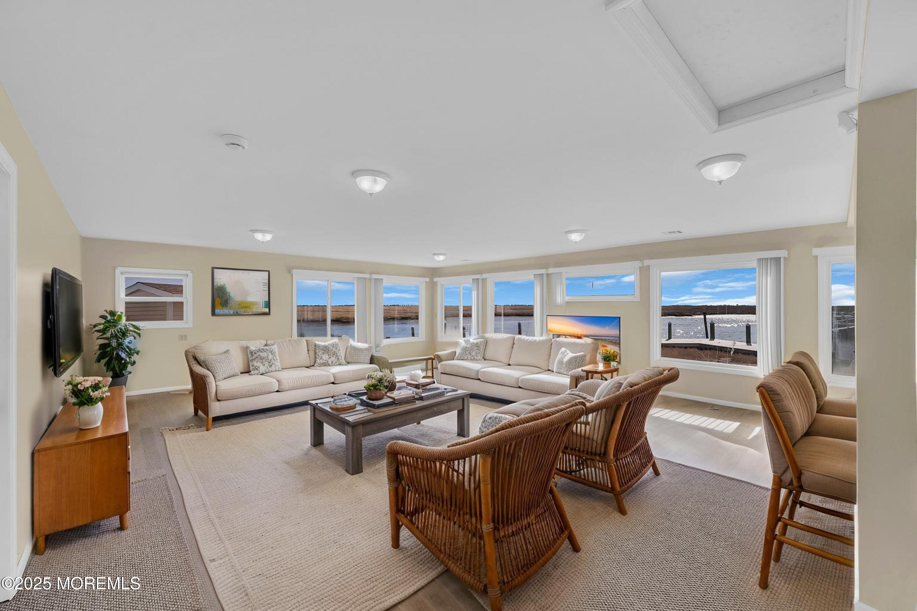 164 North Spinnaker Drive Little Egg Harbor, NJ 08087 - Photo 25 of 33 a living room with furniture and a flat screen tv