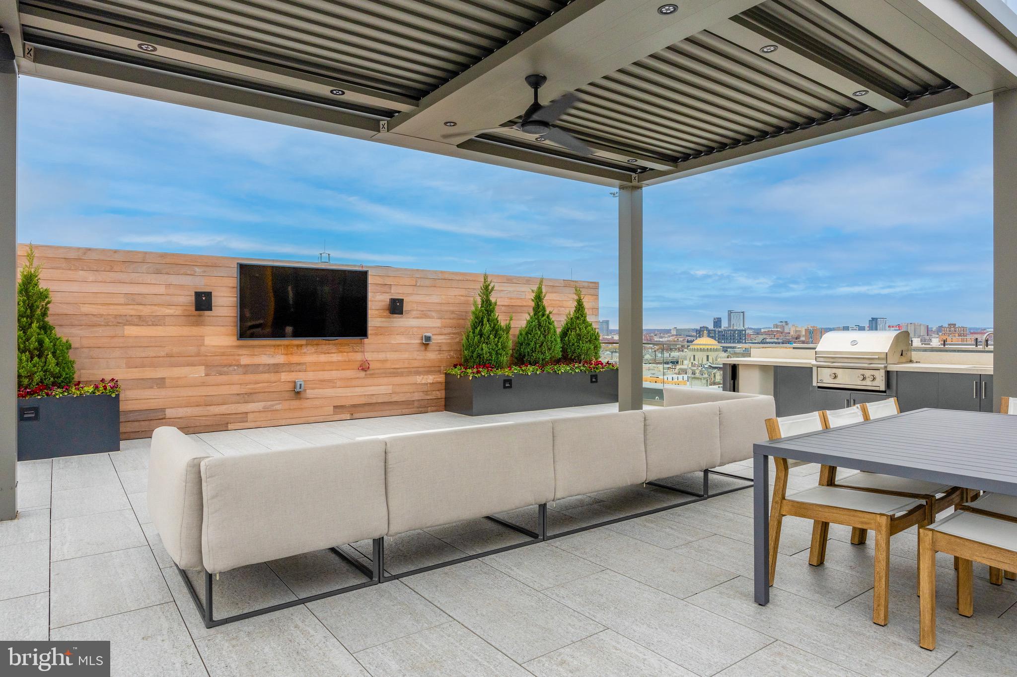 569 North 5th Street, Unit 202 Philadelphia, PA 19123 - Photo 31 of 49 a kitchen with a table and chairs