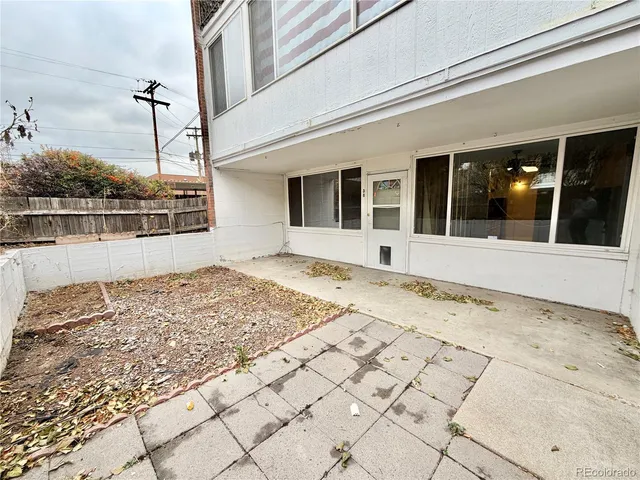 a view of a backyard of the house