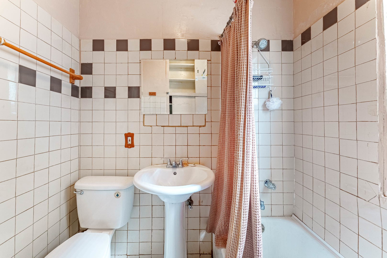 7149 South Wood Street Chicago, IL 60636 - Photo 11 of 26 a bathroom with a sink and mirror