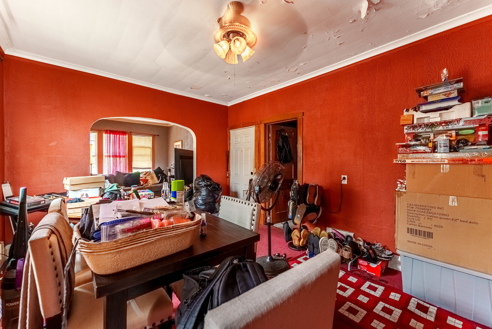 7149 South Wood Street Chicago, IL 60636 - Photo 18 of 26 a view of a dining room with furniture and chandelier