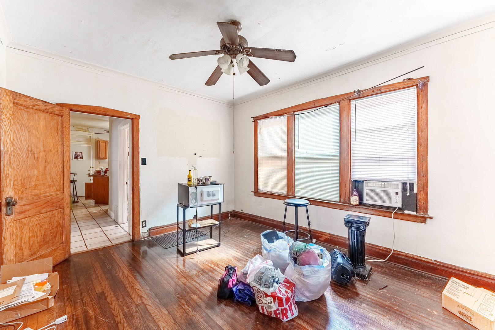 7149 South Wood Street Chicago, IL 60636 - Photo 5 of 26 a living room with furniture and a large window