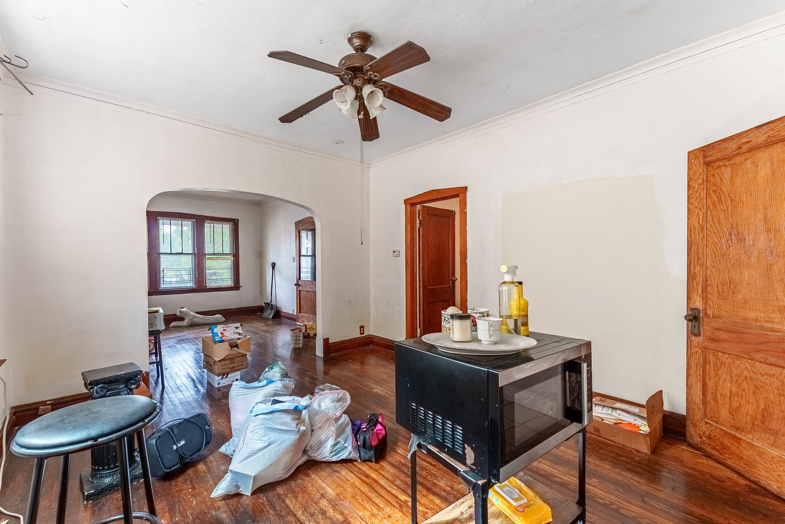 7149 South Wood Street Chicago, IL 60636 - Photo 6 of 26 a living room with furniture and a wooden floor