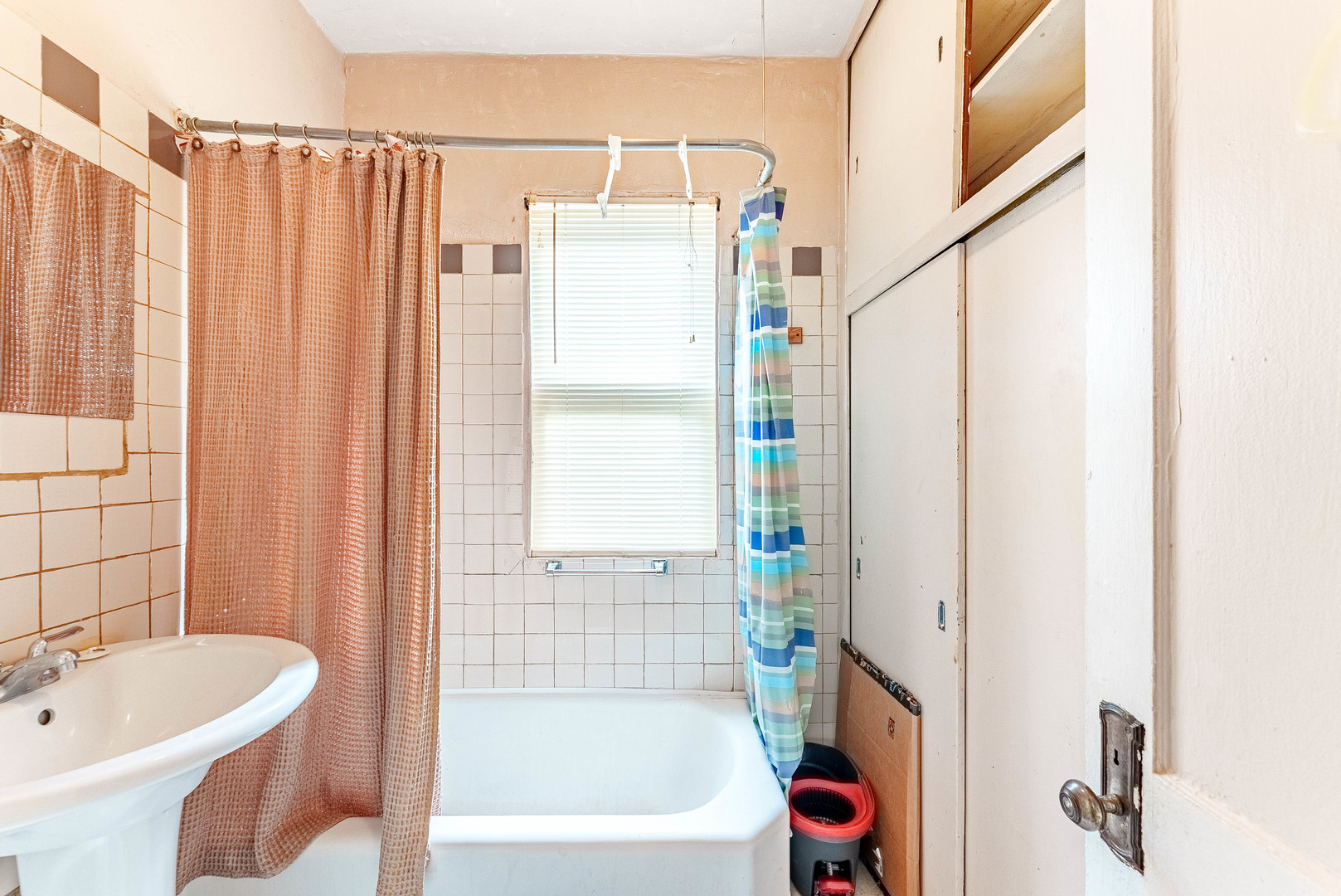 7149 South Wood Street Chicago, IL 60636 - Photo 10 of 26 a bathroom with a sink a toilet and shower