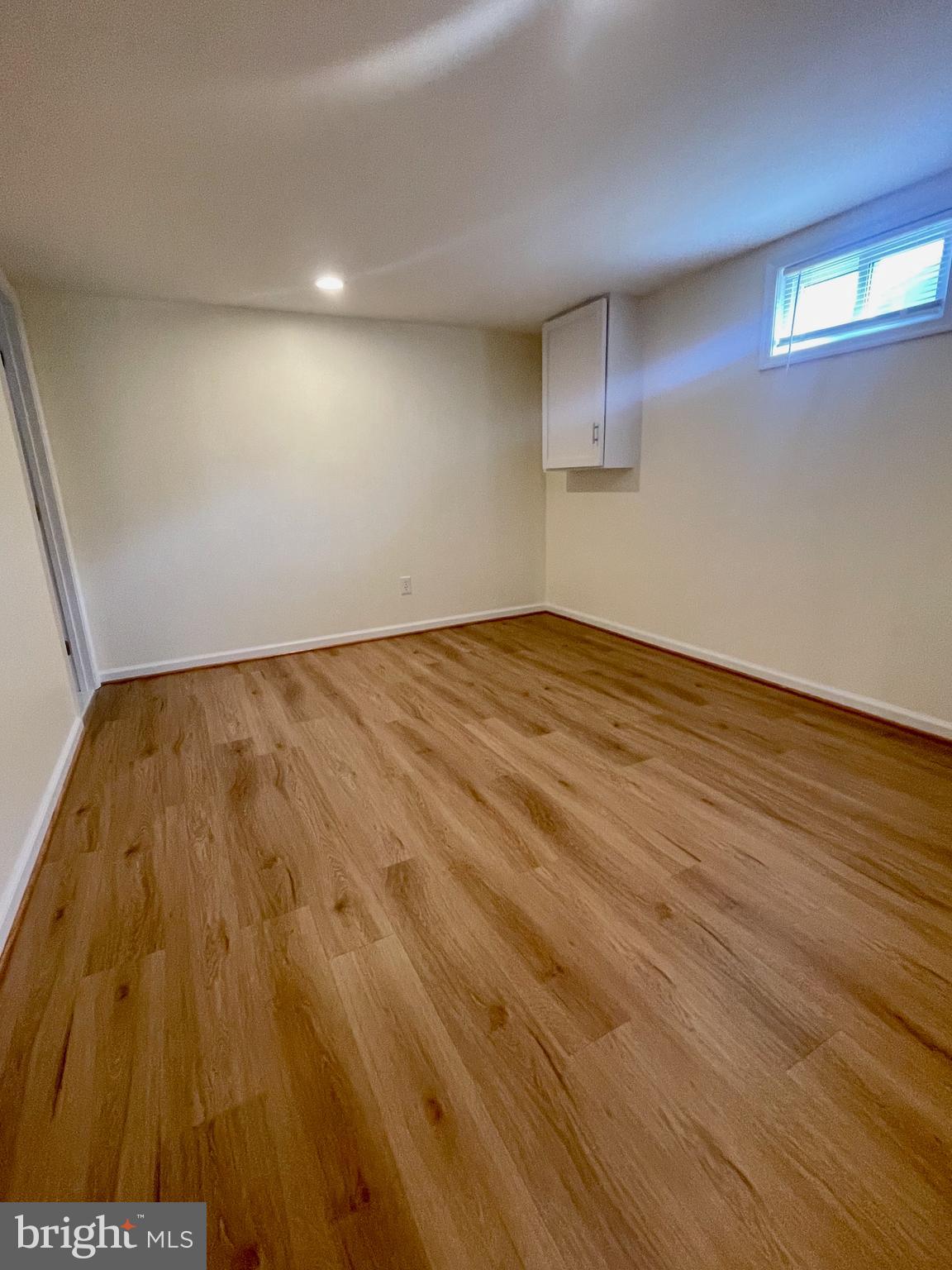 12505 Feldon Street Silver Spring, MD 20906 - Photo 17 of 32 a view of empty room with wooden floor