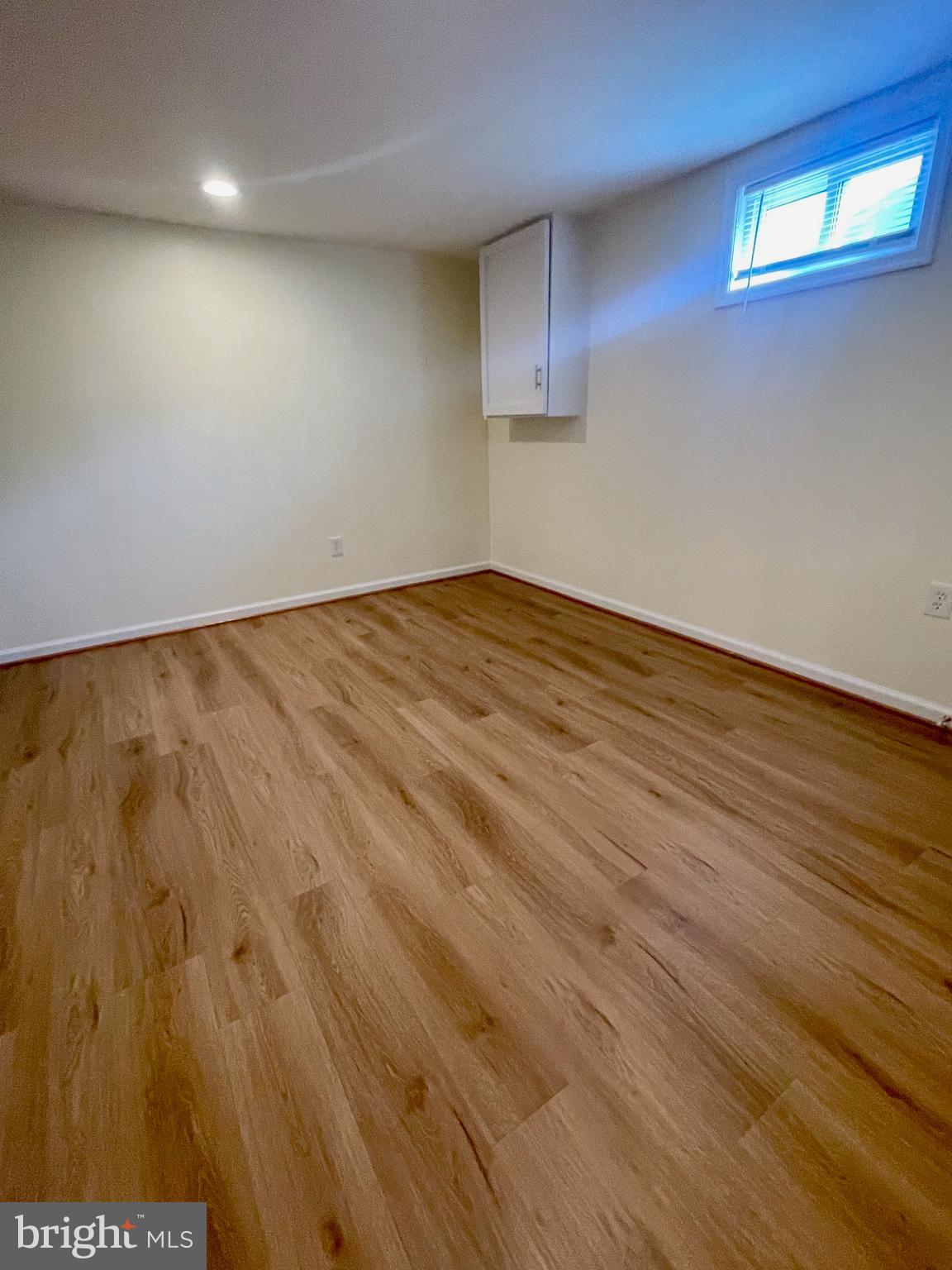 12505 Feldon Street Silver Spring, MD 20906 - Photo 18 of 32 a view of empty room with wooden floor
