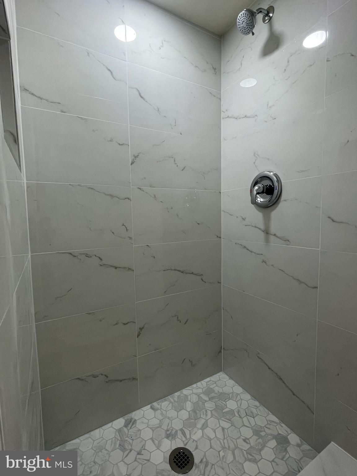 12505 Feldon Street Silver Spring, MD 20906 - Photo 21 of 32 a bathroom with a shower