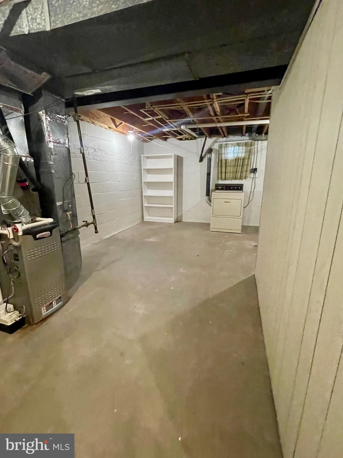 12505 Feldon Street Silver Spring, MD 20906 - Photo 22 of 32 a view of a garage with wooden walls