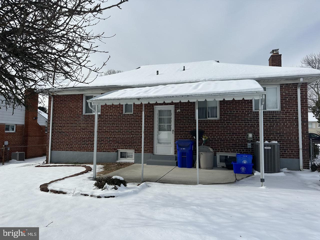 12505 Feldon Street Silver Spring, MD 20906 - Photo 28 of 32 a front view of a house with a patio