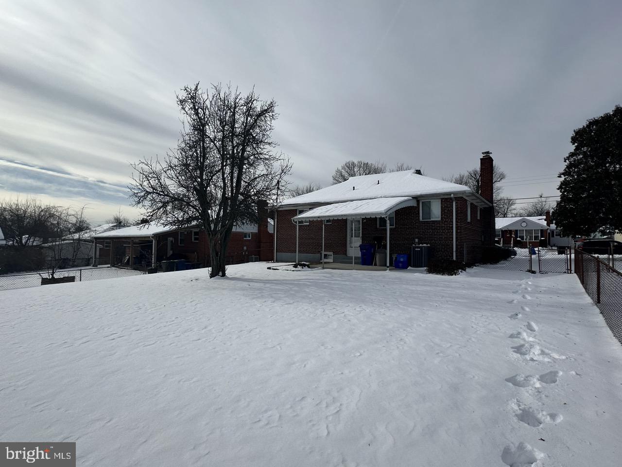 12505 Feldon Street Silver Spring, MD 20906 - Photo 29 of 32 a front view of a house with a yard
