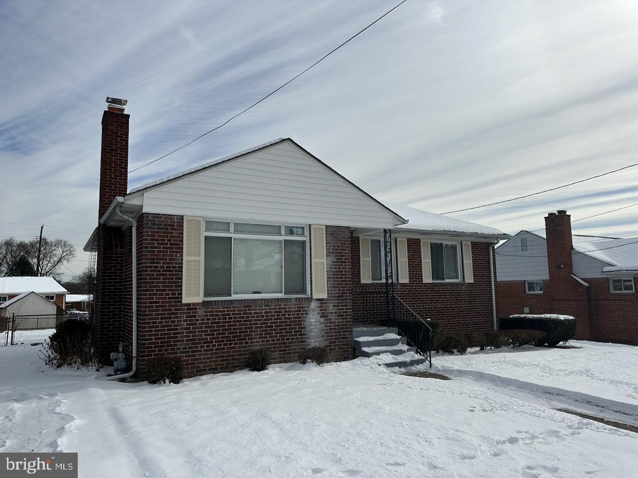 12505 Feldon Street Silver Spring, MD 20906 - Photo 4 of 32 a front view of a house with a yard