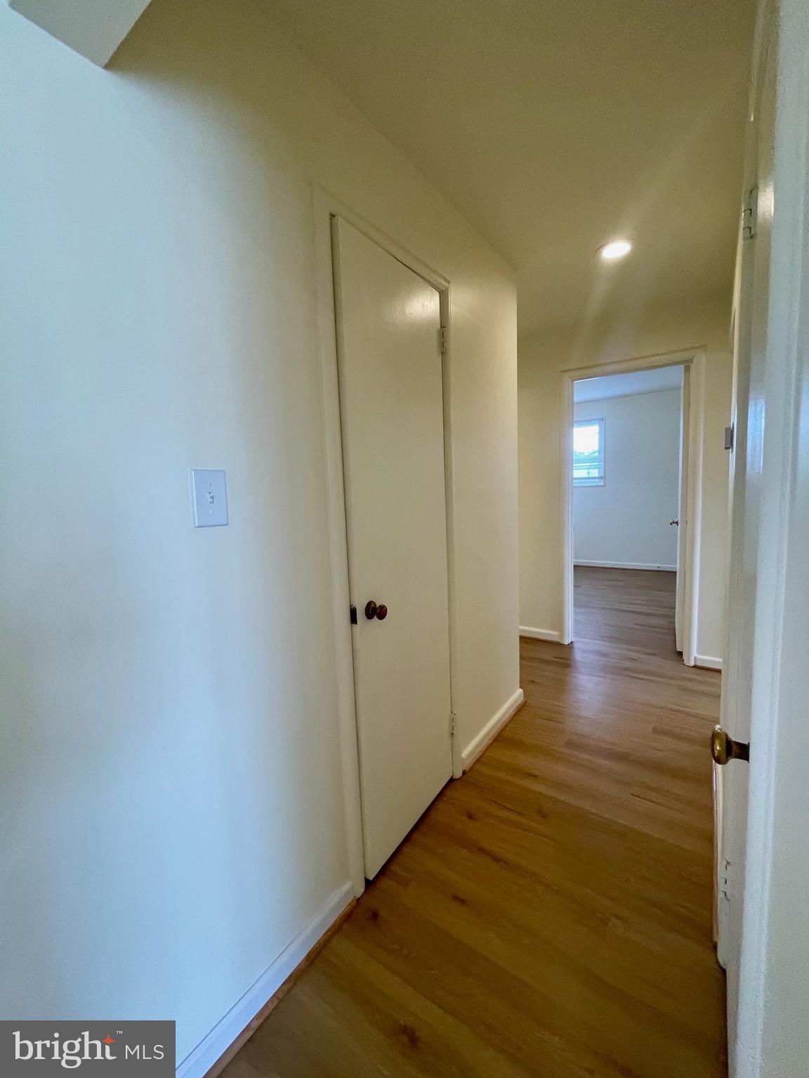 12505 Feldon Street Silver Spring, MD 20906 - Photo 8 of 32 a view of a hallway with wooden floor
