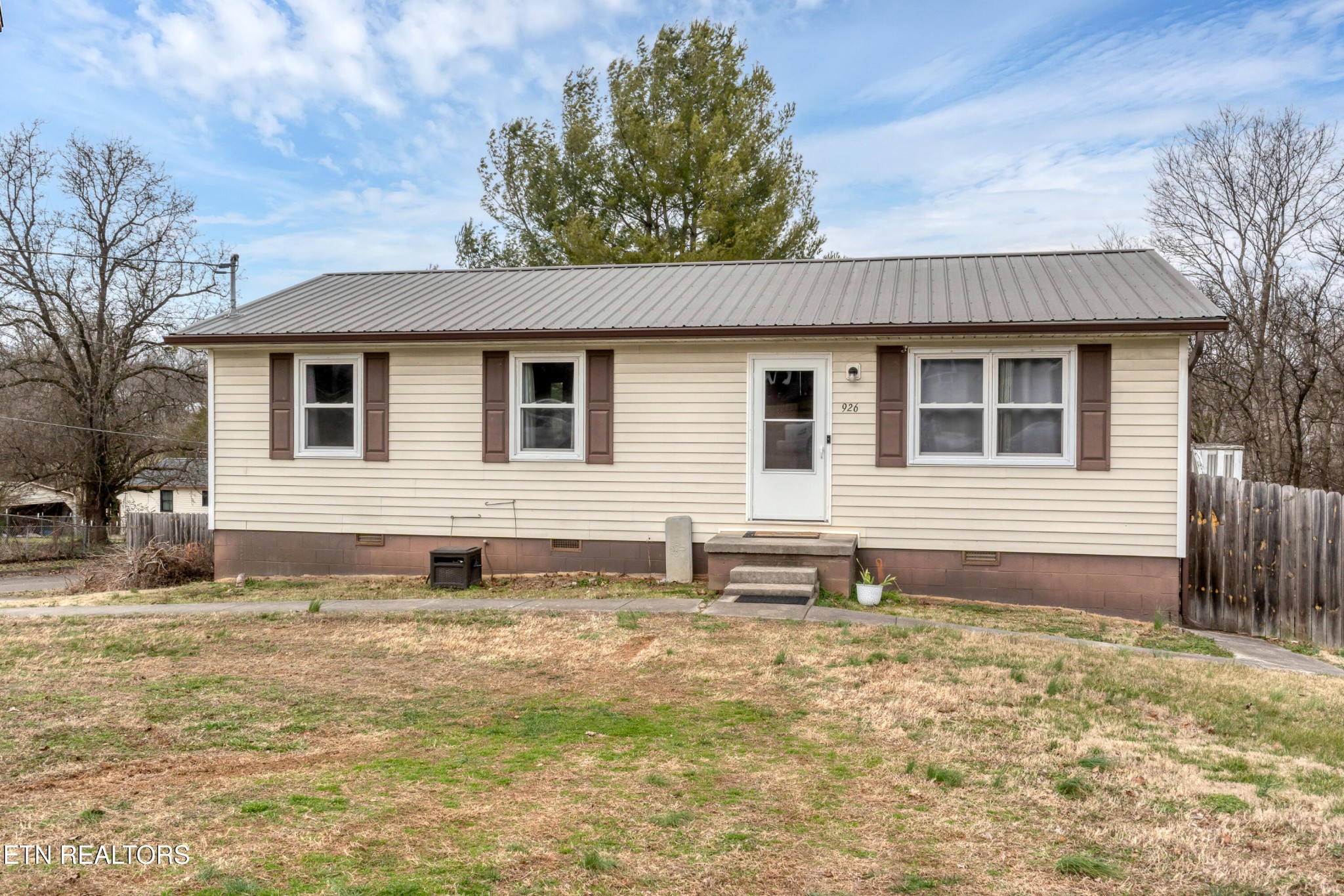 926 Amy Street Seymour, TN 37865 - Photo 1 of 22 a backyard of a house with table and chairs