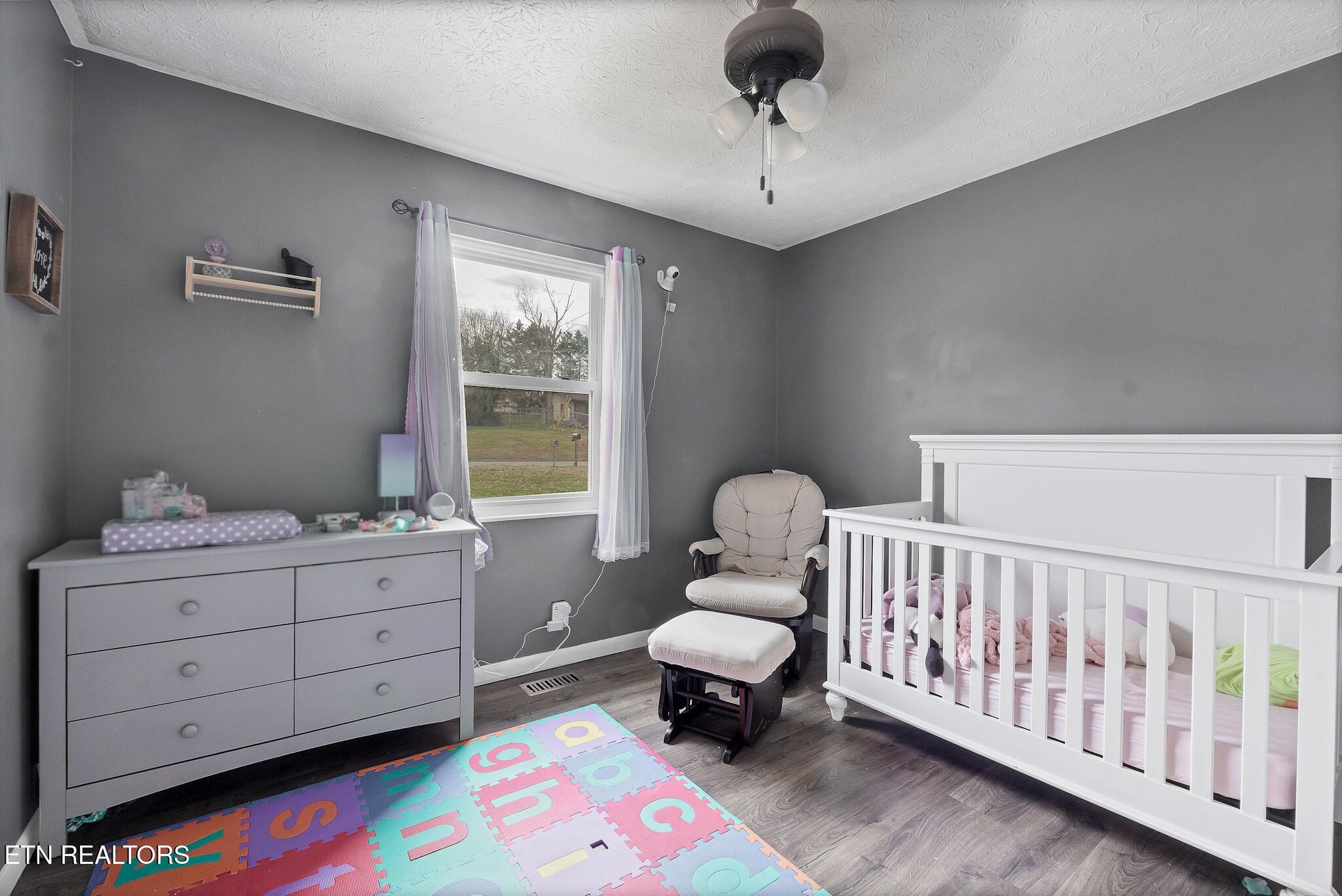926 Amy Street Seymour, TN 37865 - Photo 14 of 22 a bedroom with a bed and window