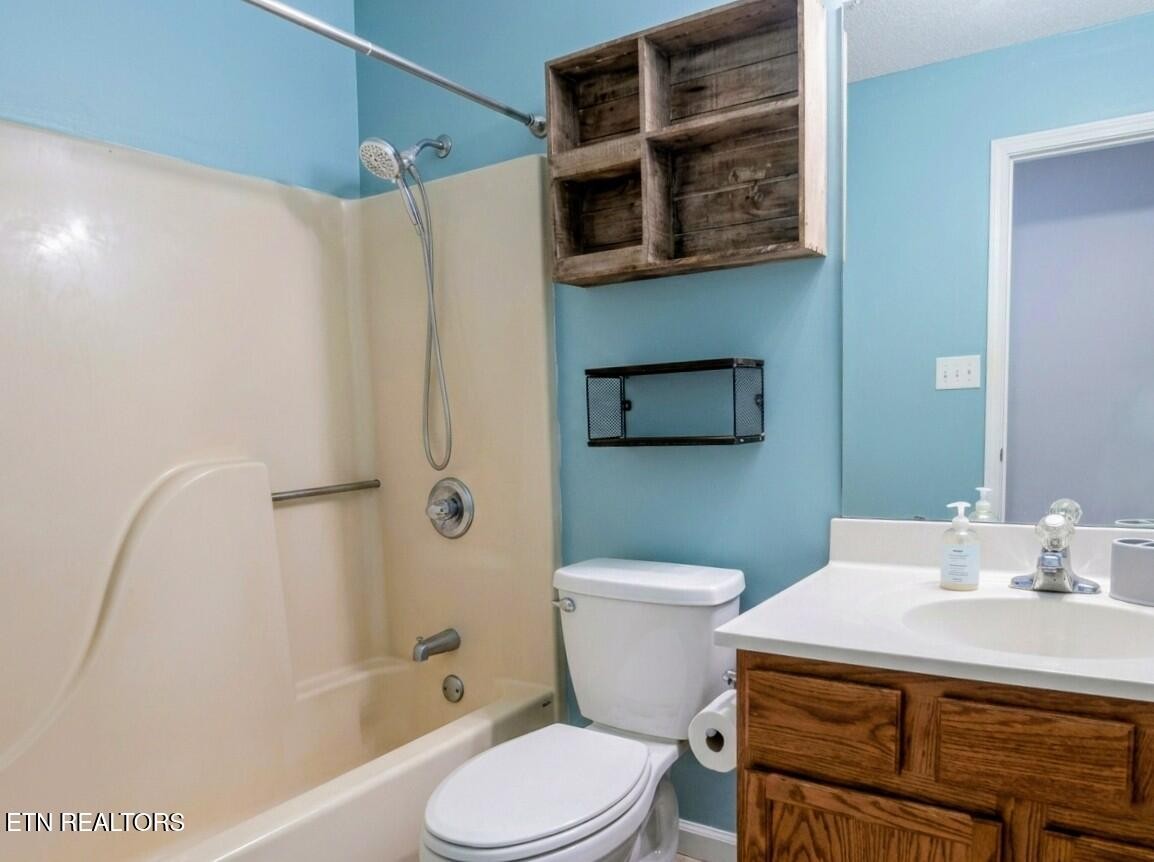 926 Amy Street Seymour, TN 37865 - Photo 18 of 22 a bathroom with a sink a toilet and shower