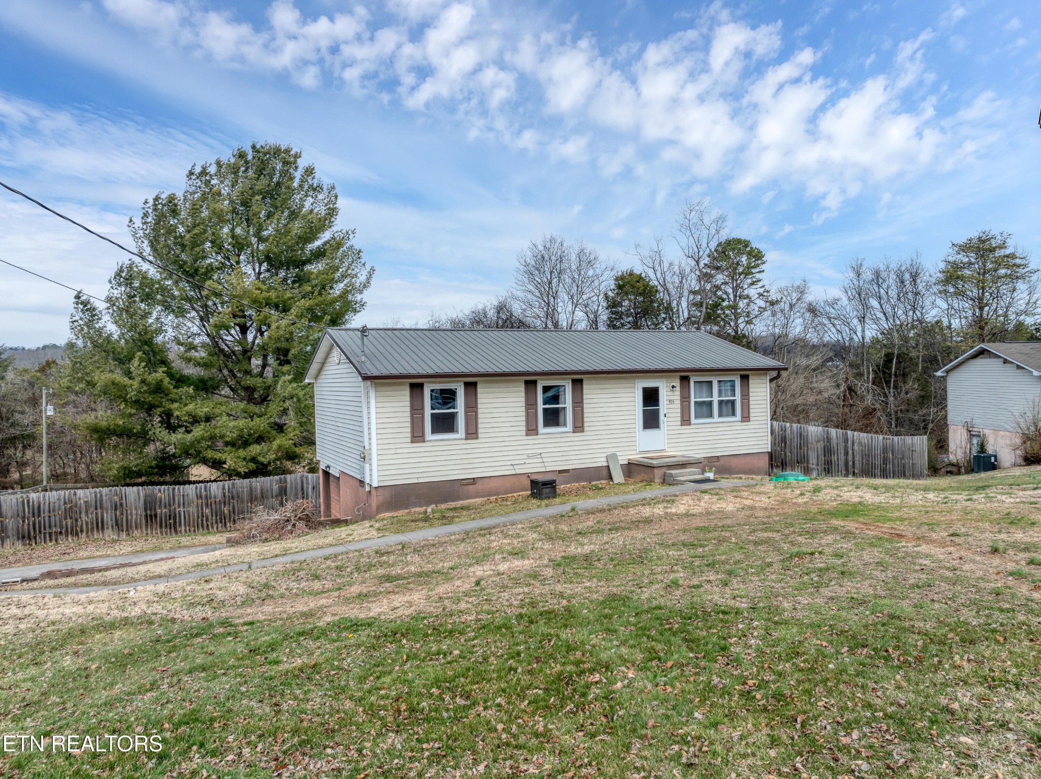 926 Amy Street Seymour, TN 37865 - Photo 3 of 22 a house that has a tree in front of it