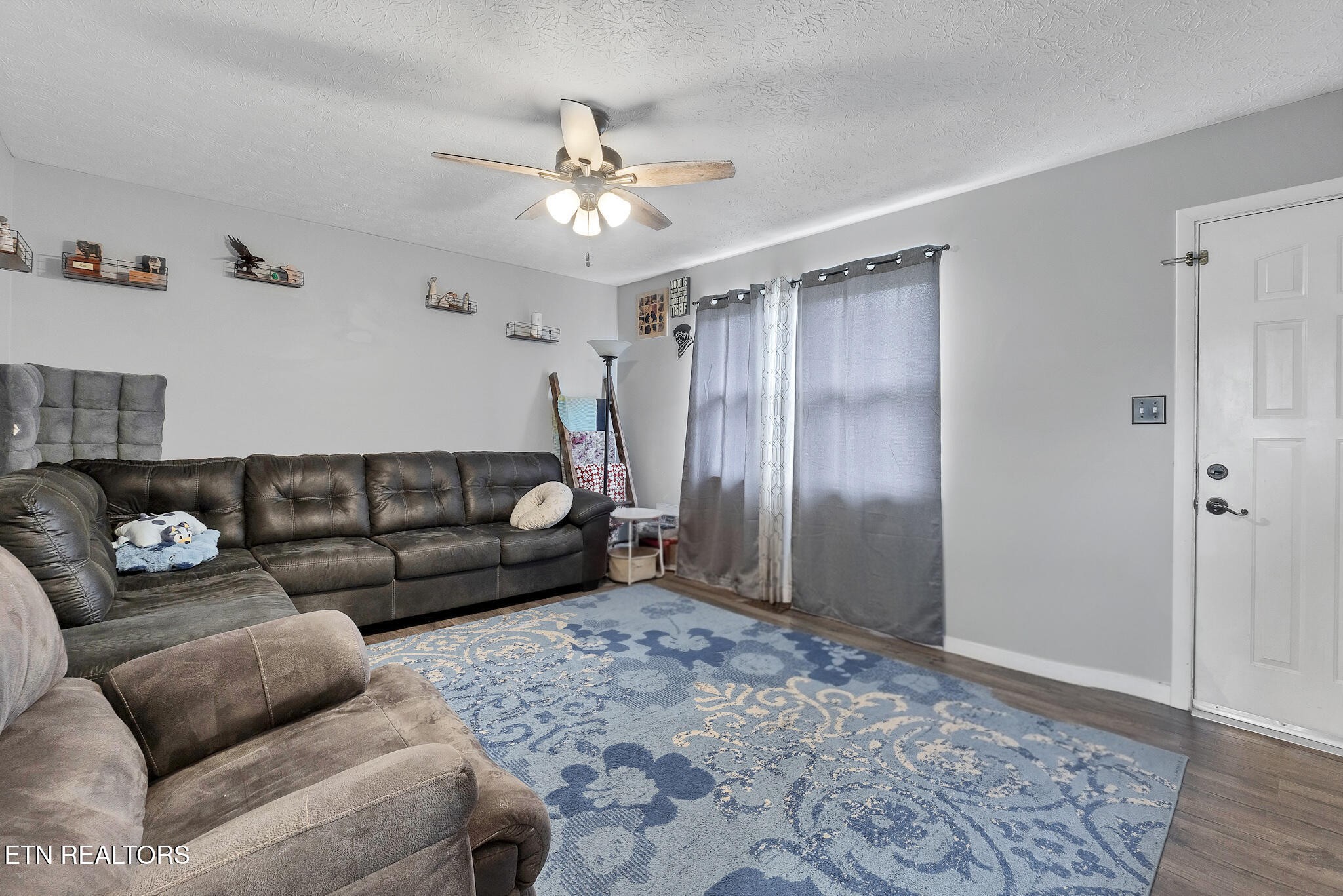 926 Amy Street Seymour, TN 37865 - Photo 5 of 22 a living room with furniture and a ceiling fan