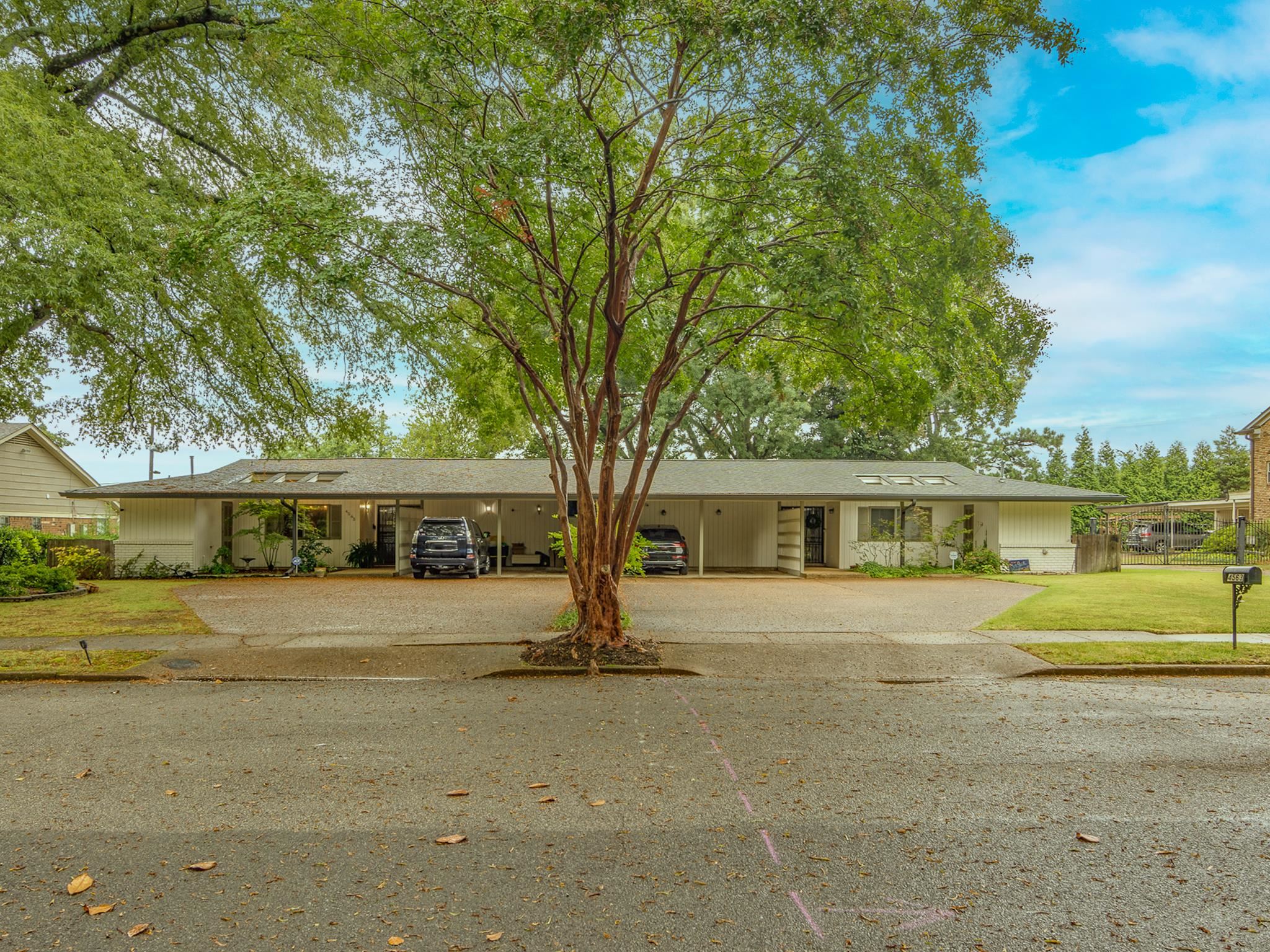 4563 Aldersgate Road Memphis, TN 38117 - Photo 2 of 22 a view of house with outdoor space and tree in beside