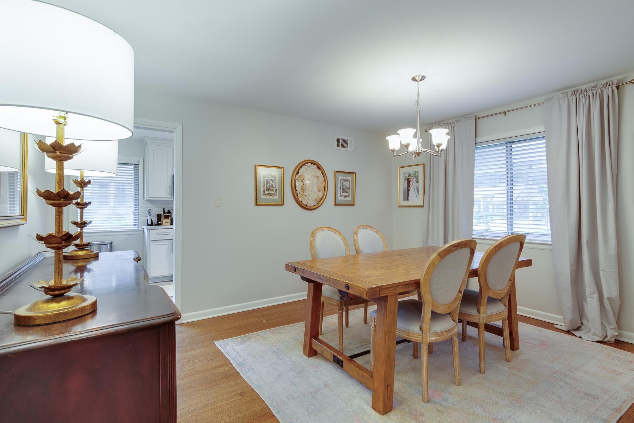 4563 Aldersgate Road Memphis, TN 38117 - Photo 7 of 22 a view of a dining room with furniture and chandelier