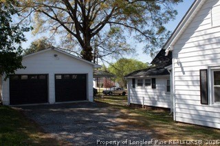 302 North 13th Street Erwin, NC 28339 - Photo 7 of 20 a front view of a house with a yard