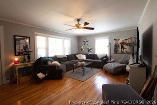 302 North 13th Street Erwin, NC 28339 - Photo 10 of 20 a living room with furniture and a flat screen tv