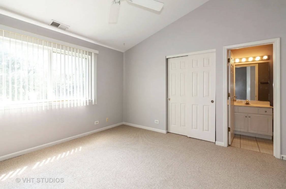 1069 Ripple Ridge Darien, IL 60561 - Photo 8 of 12 a view of an empty room with window