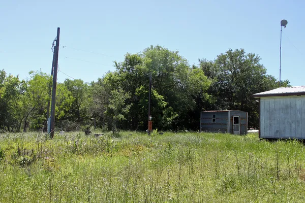 a house view with a garden space