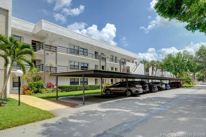 1950 Southwest Palm City Road, Unit 3209 Stuart, FL 34994 - Photo 30 of 64 Building 3, Elevator and covered parking.