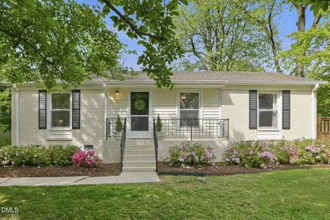 front view of a house and a yard