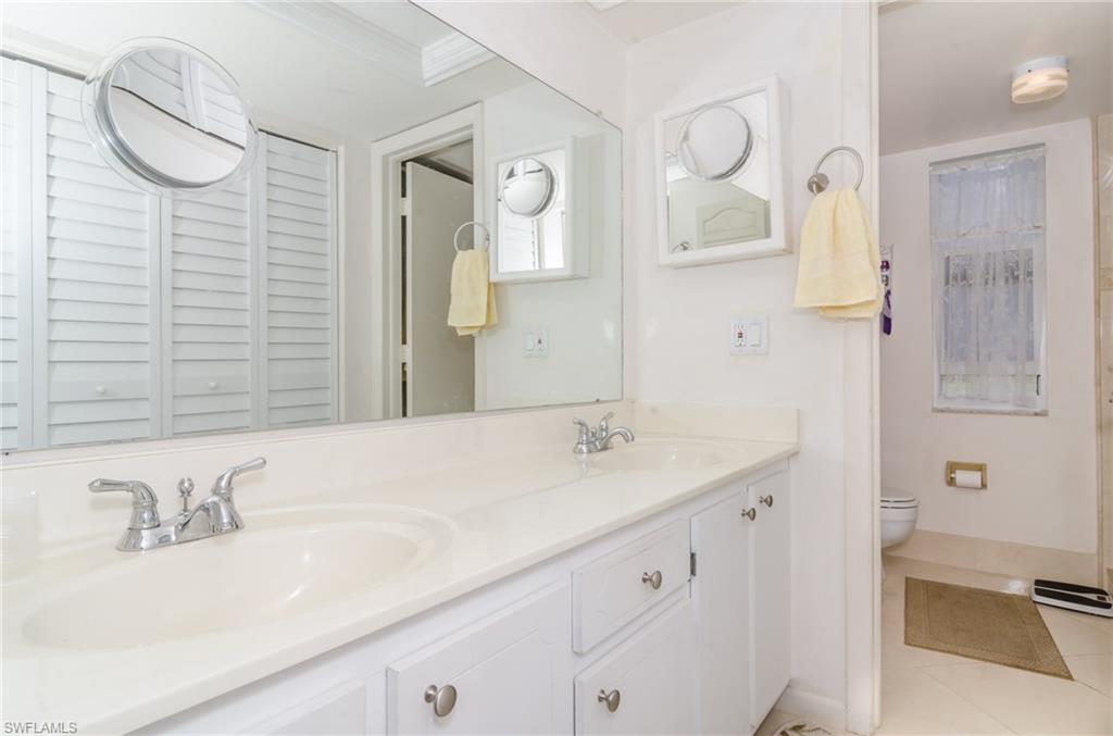 865 Teryl Road, Unit 2111 Naples, FL 34112 - Photo 11 of 21 Master Bath with dual sinks