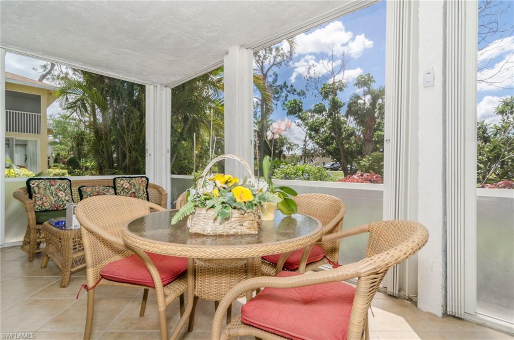 865 Teryl Road, Unit 2111 Naples, FL 34112 - Photo 8 of 21 Peaceful screened-in lanai with manual shutters